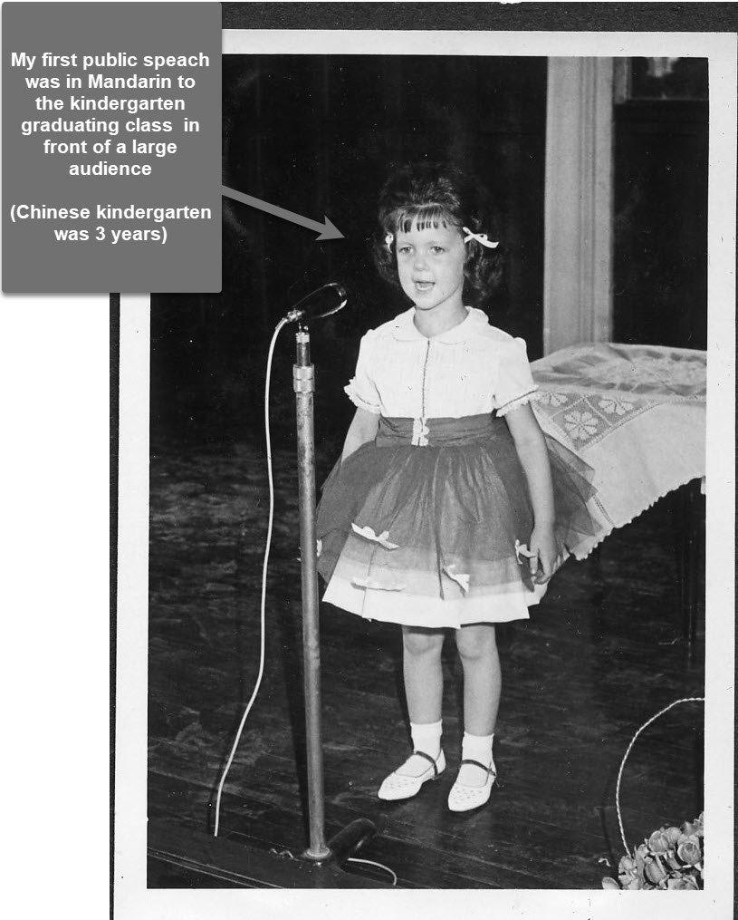 Judy giving her first public speech, in Mandarin, at her kindergarten's closing exercises in Taiwan, 1963